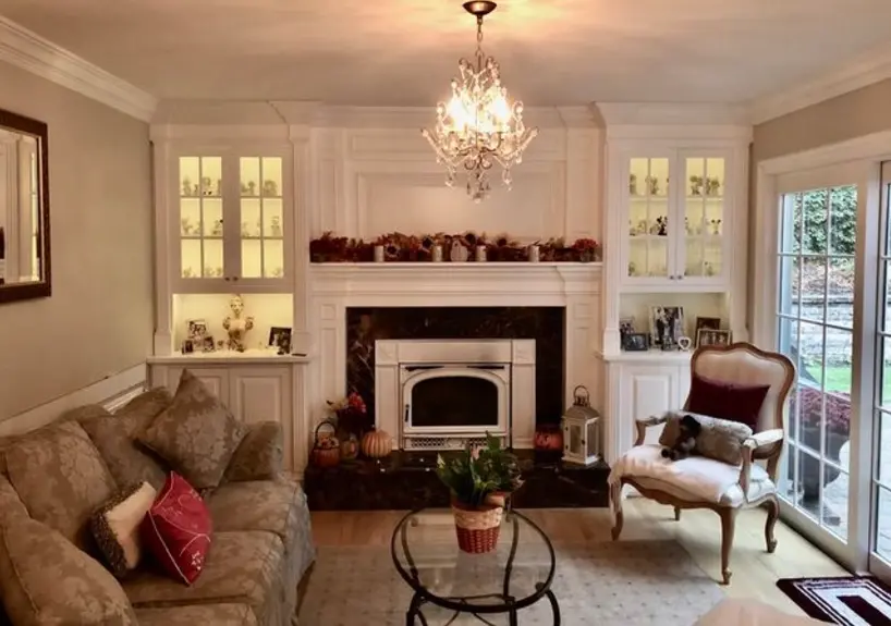 one sofa and a chair are arranged of a dining room